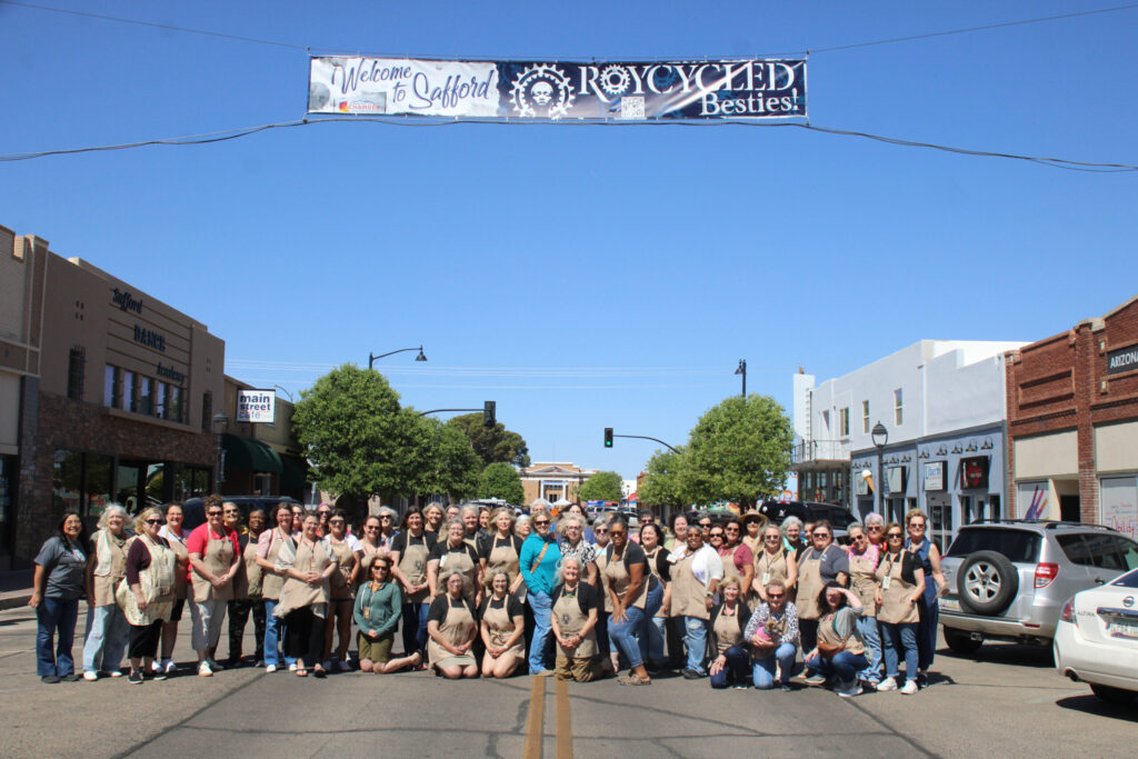 Retreat Attendees under Main Street Banner